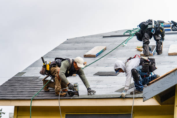 Professional Storm Damage Roof Repair technician working in Old Orchard Beach, ME